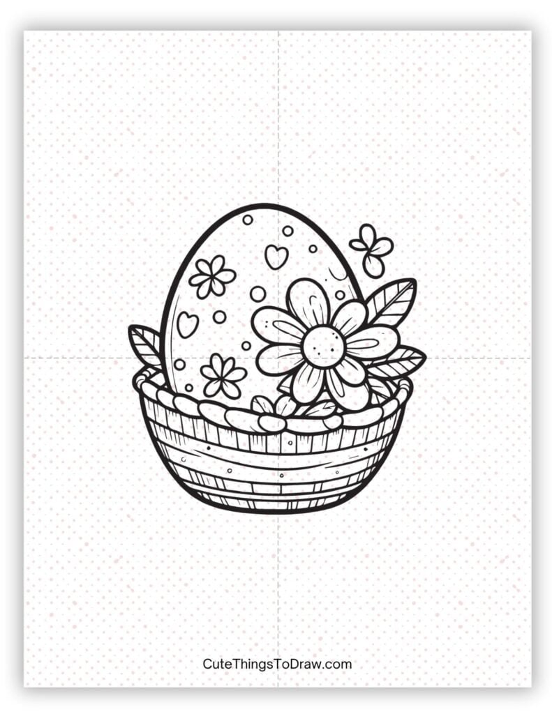 Easter egg sitting in a basket to draw